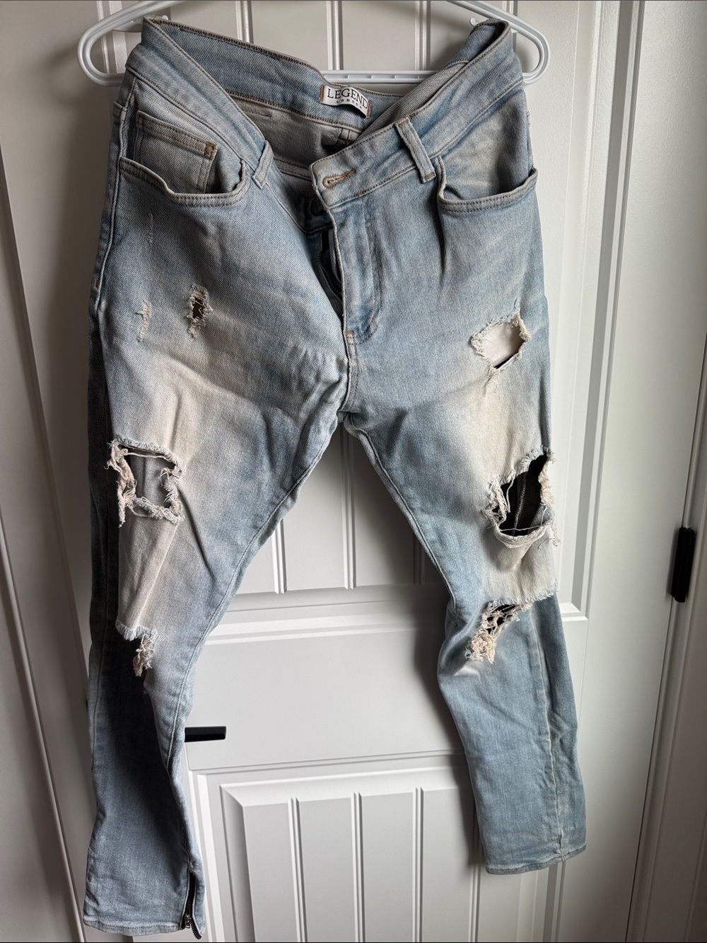Slim Straight Distressed Jeans in Light Blue
